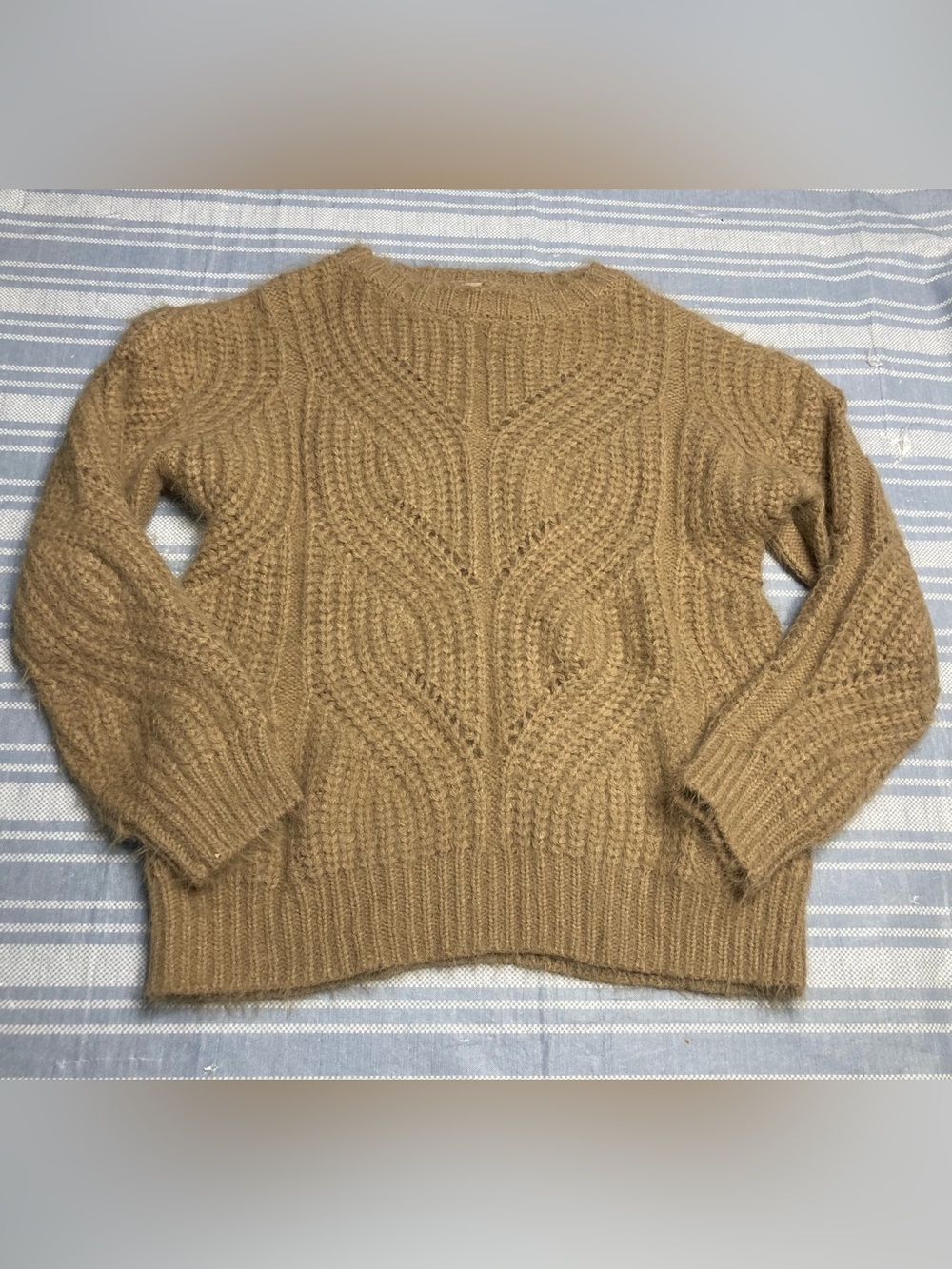 Philosophy tan cable-knit sweater.
